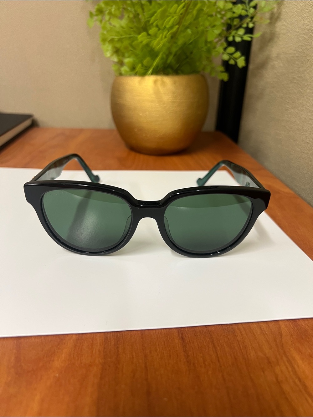Gucci Black Frame Sunglasses with Green Lenses - Women's